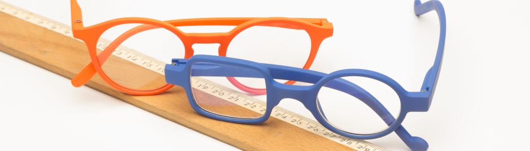 Kids glasses on a ruler